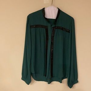 Emerald green button down blouse. With detail.